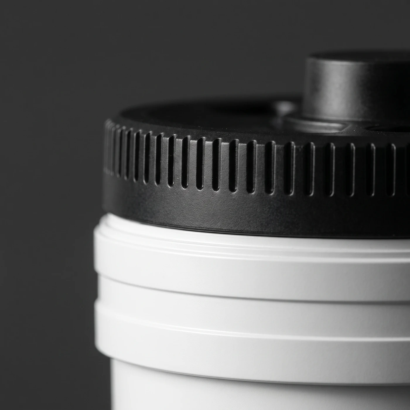 The knurled cap, opened and closed by hand